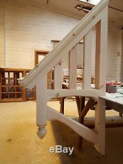 Timber Door Canopies Bespoke wooden porch canopy, gallows bracket
