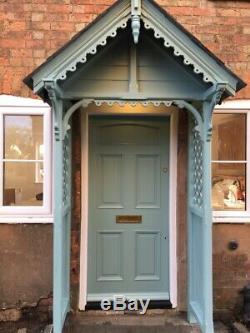 Victorian wooden Carved canopy porch With Slate Roof And Lattice Sides